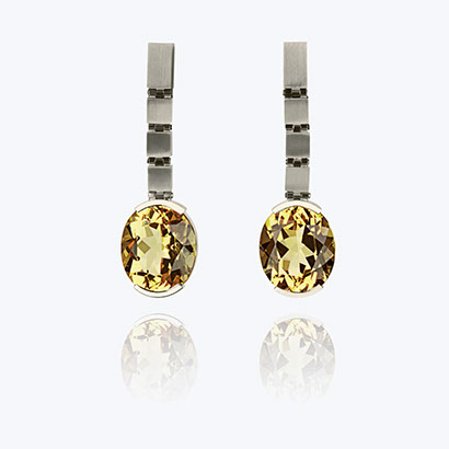 Ohrschmuck aus 18 Karat Weißgold mit gelben Beryllen